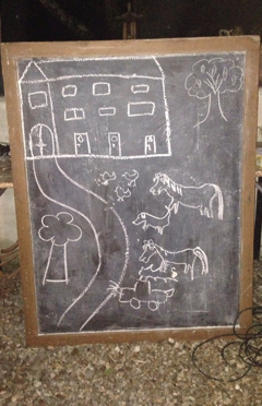 Malen auf der Schiefertafel